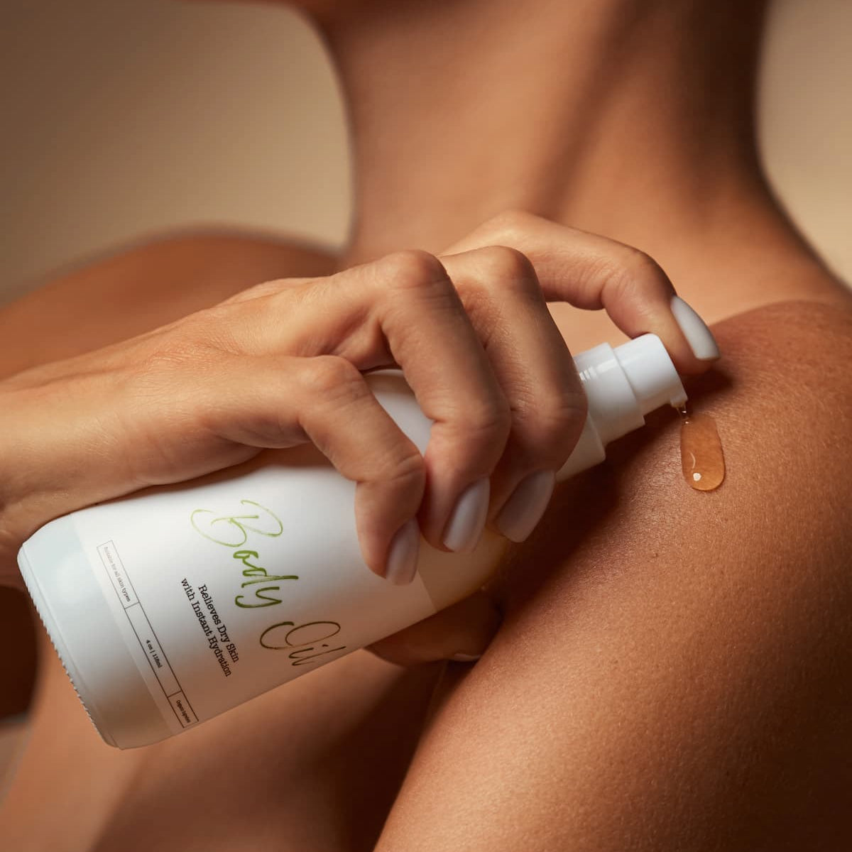 Bella Palms Body Oil Model in use