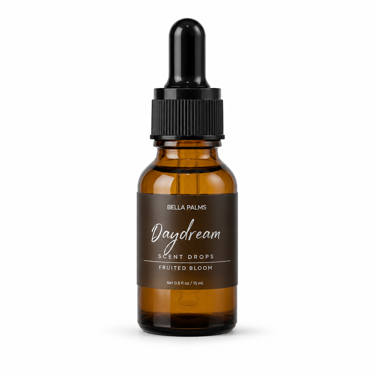 An amber glass dropper bottle of Bella Palms Daydream Scent Drops, labeled 'Fruited Bloom', on a clean white background.